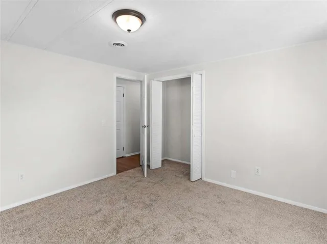 a view of lake with a yard