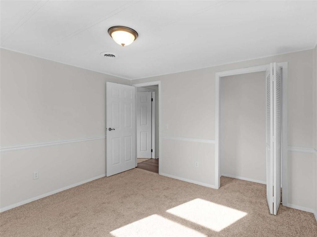 296 Reeves Road Jackson, GA 30233 - Photo 28 of 78 a view of a room with a ceiling fan