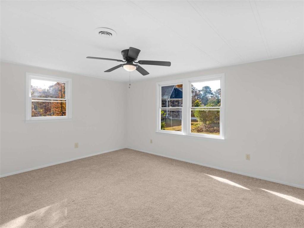 296 Reeves Road Jackson, GA 30233 - Photo 30 of 78 a view of an empty room with a window