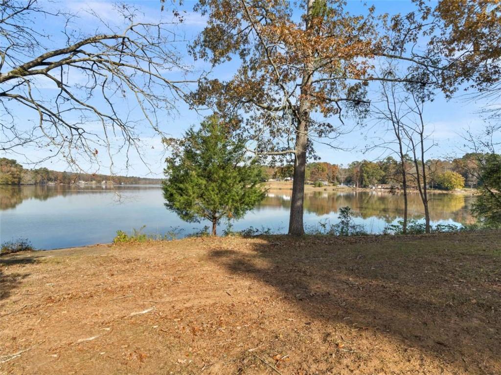 296 Reeves Road Jackson, GA 30233 - Photo 60 of 78 a view of lake with a yard