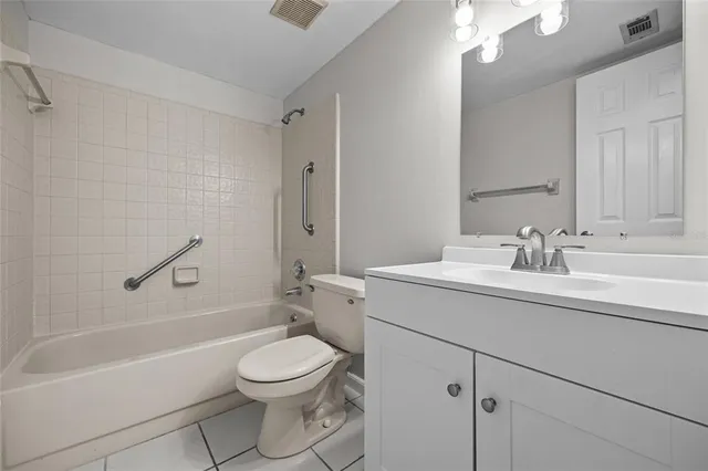 a bathroom with a sink a toilet and a bathtub