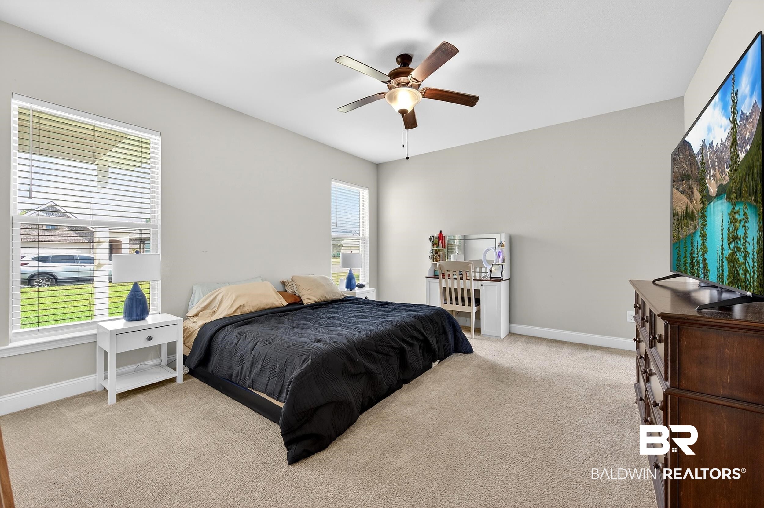 1084 Stella Road Foley, AL 36535 - Photo 16 of 31 Bedroom featuring light carpet and ceiling fan