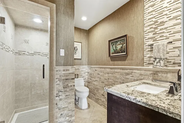 a living room with fireplace furniture and a wooden floor