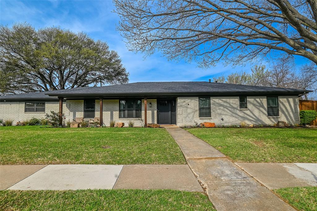 1701 Brown Trail Hurst, TX 76054 - Photo 1 of 1 a view of a house with a garden