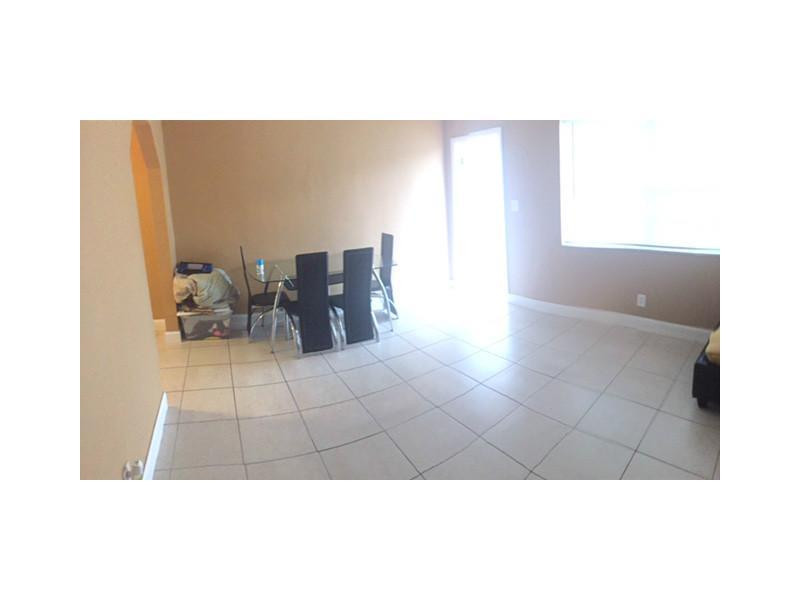1013 Foster Road, Unit 13 Hallandale Beach, FL 33009 - Photo 23 of 26 Exterior Front
