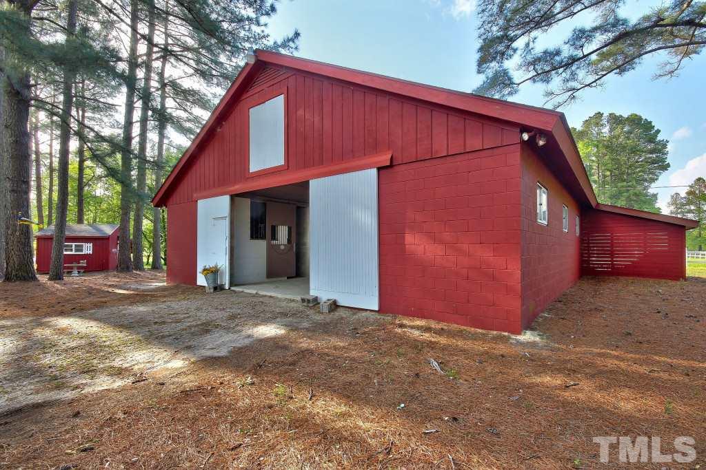6257 Moore Road Red Oak, NC 27856 - Photo 20 of 25 a view of a house with a yard