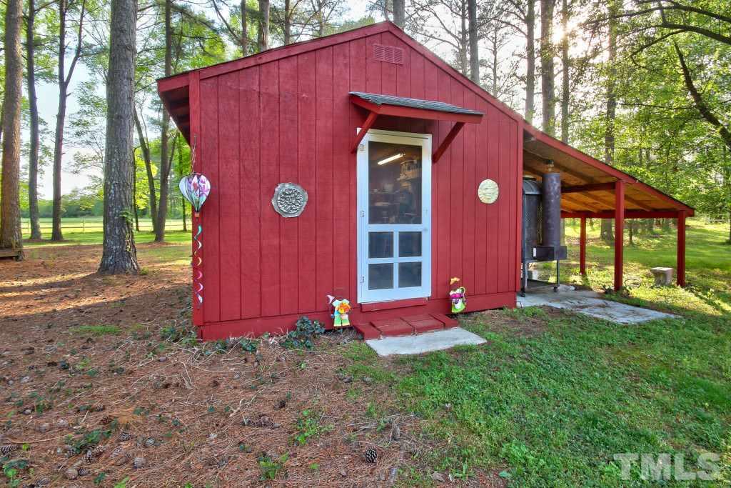 6257 Moore Road Red Oak, NC 27856 - Photo 23 of 25 a front view of house with yard