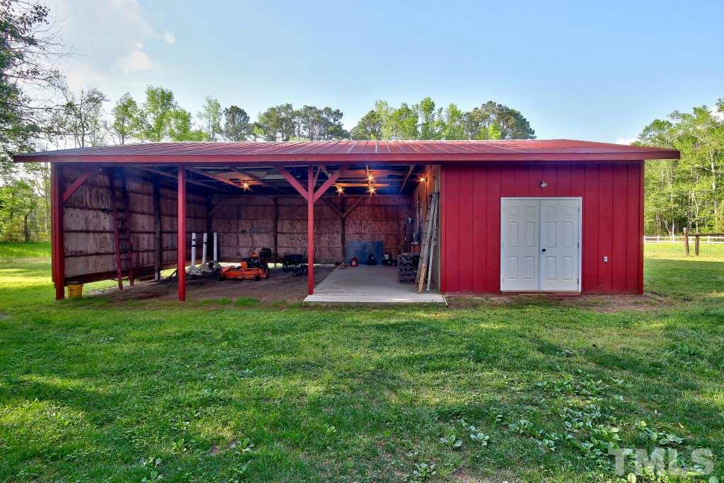 6257 Moore Road Red Oak, NC 27856 - Photo 24 of 25 front view of a house with a yard