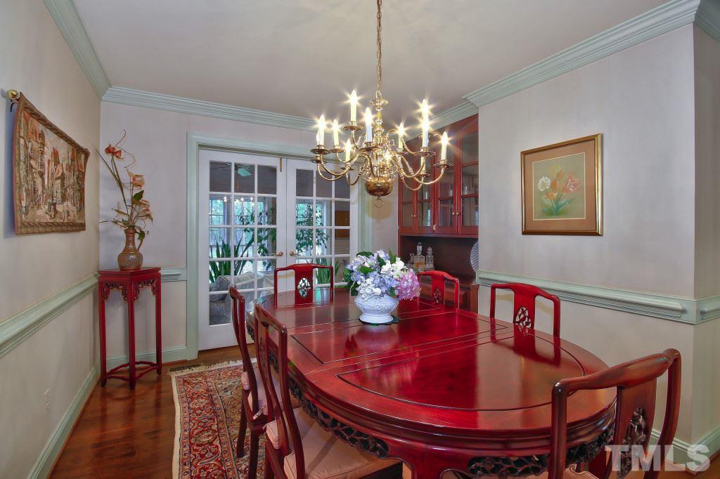 6257 Moore Road Red Oak, NC 27856 - Photo 4 of 25 a view of a dining room with furniture and chandelier
