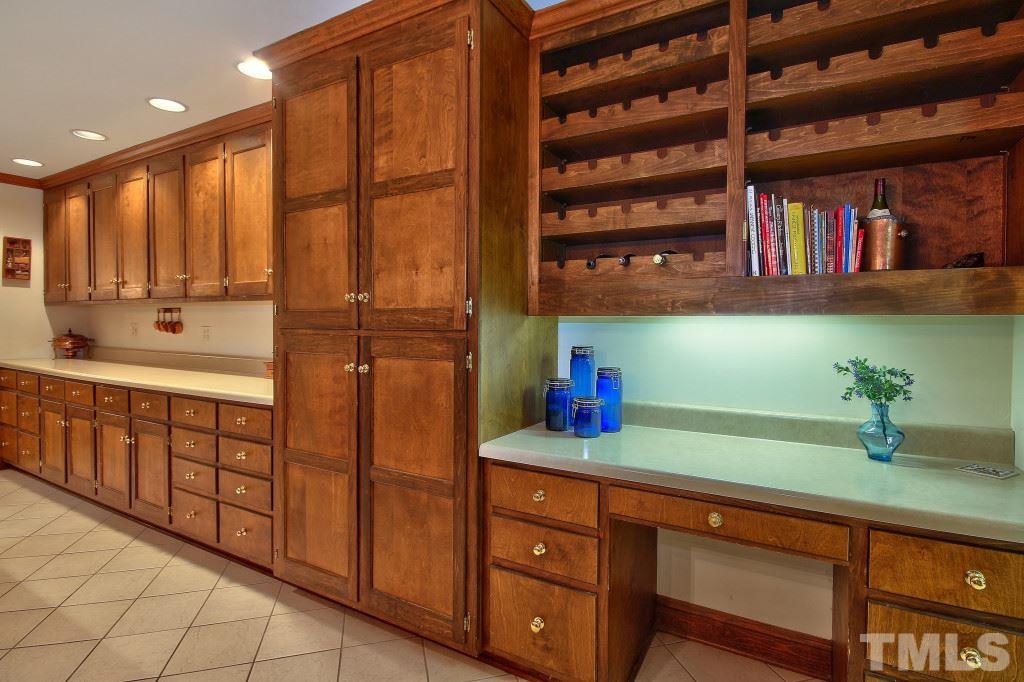 6257 Moore Road Red Oak, NC 27856 - Photo 7 of 25 a kitchen with stainless steel appliances cabinets and a large window
