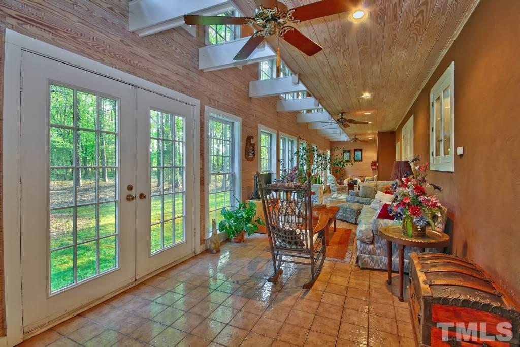 6257 Moore Road Red Oak, NC 27856 - Photo 10 of 25 a view of a dining room with furniture window and outside view