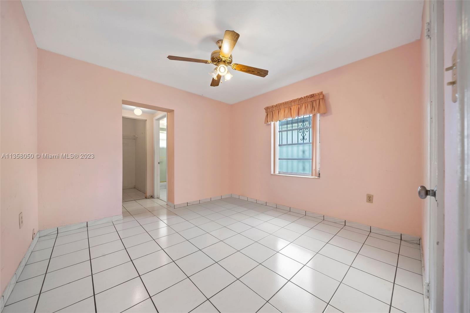 1911 Southwest 23rd Street Miami, FL 33145 - Photo 16 of 48 a view of an empty room and window