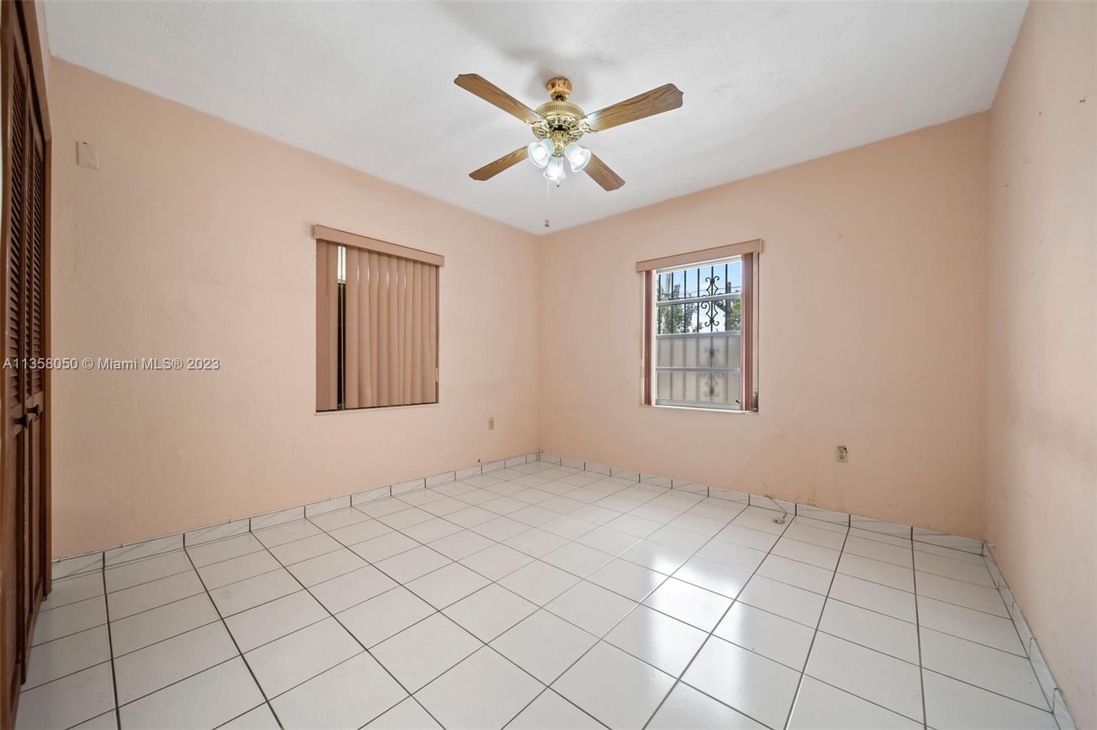 1911 Southwest 23rd Street Miami, FL 33145 - Photo 21 of 48 a view of an empty room with window