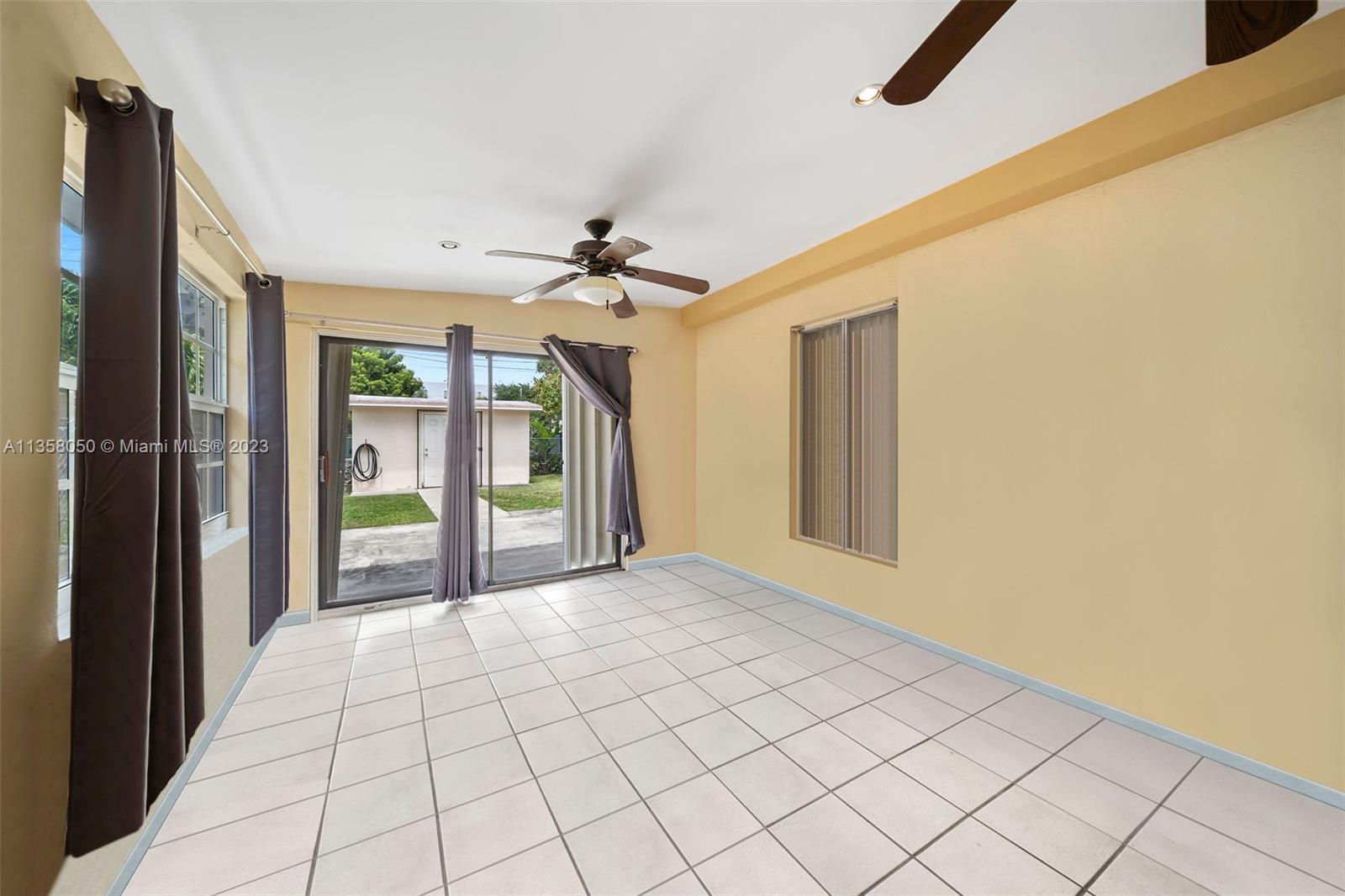 1911 Southwest 23rd Street Miami, FL 33145 - Photo 25 of 48 a view of an empty room and window