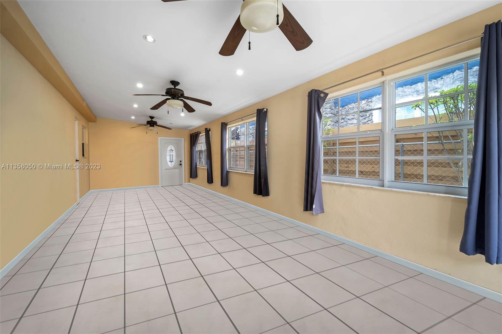 1911 Southwest 23rd Street Miami, FL 33145 - Photo 26 of 48 a view of a livingroom with a large window