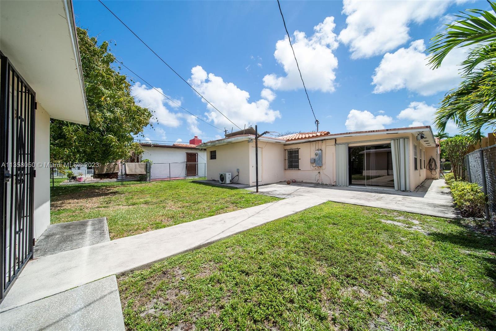 1911 Southwest 23rd Street Miami, FL 33145 - Photo 32 of 48 a view of a house with backyard and garden