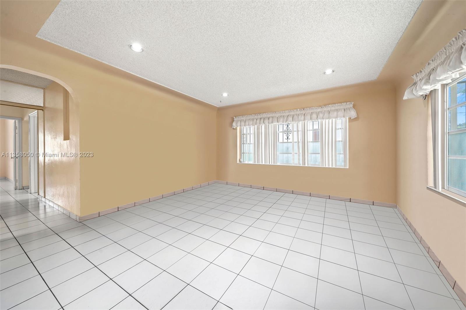 1911 Southwest 23rd Street Miami, FL 33145 - Photo 8 of 48 a view of an empty room and window