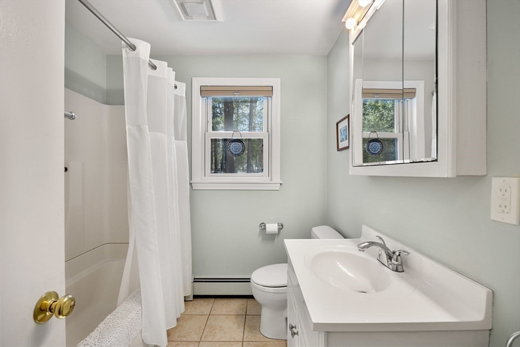 6 Cross Street Foxboro, MA 02035 - Photo 17 of 26 a bathroom with a sink toilet and shower