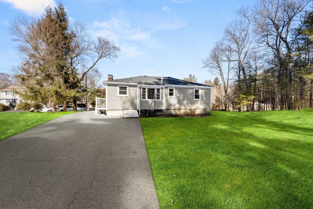 6 Cross Street Foxboro, MA 02035 - Photo 23 of 26 a view of a house with a big yard and large trees