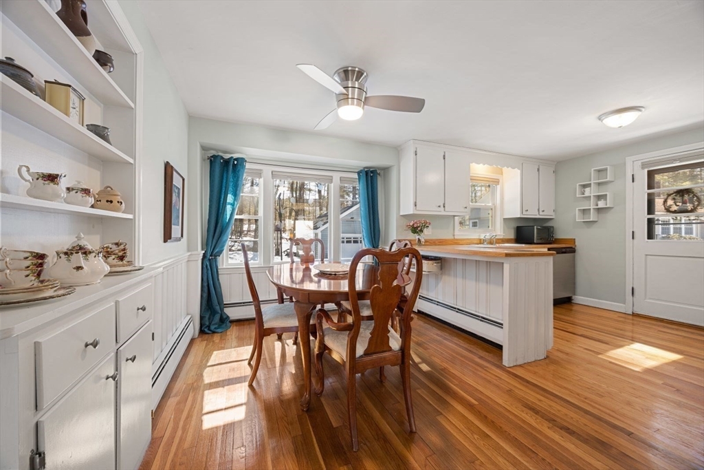 6 Cross Street Foxboro, MA 02035 - Photo 8 of 26 a view of a dining room with furniture and wooden floor