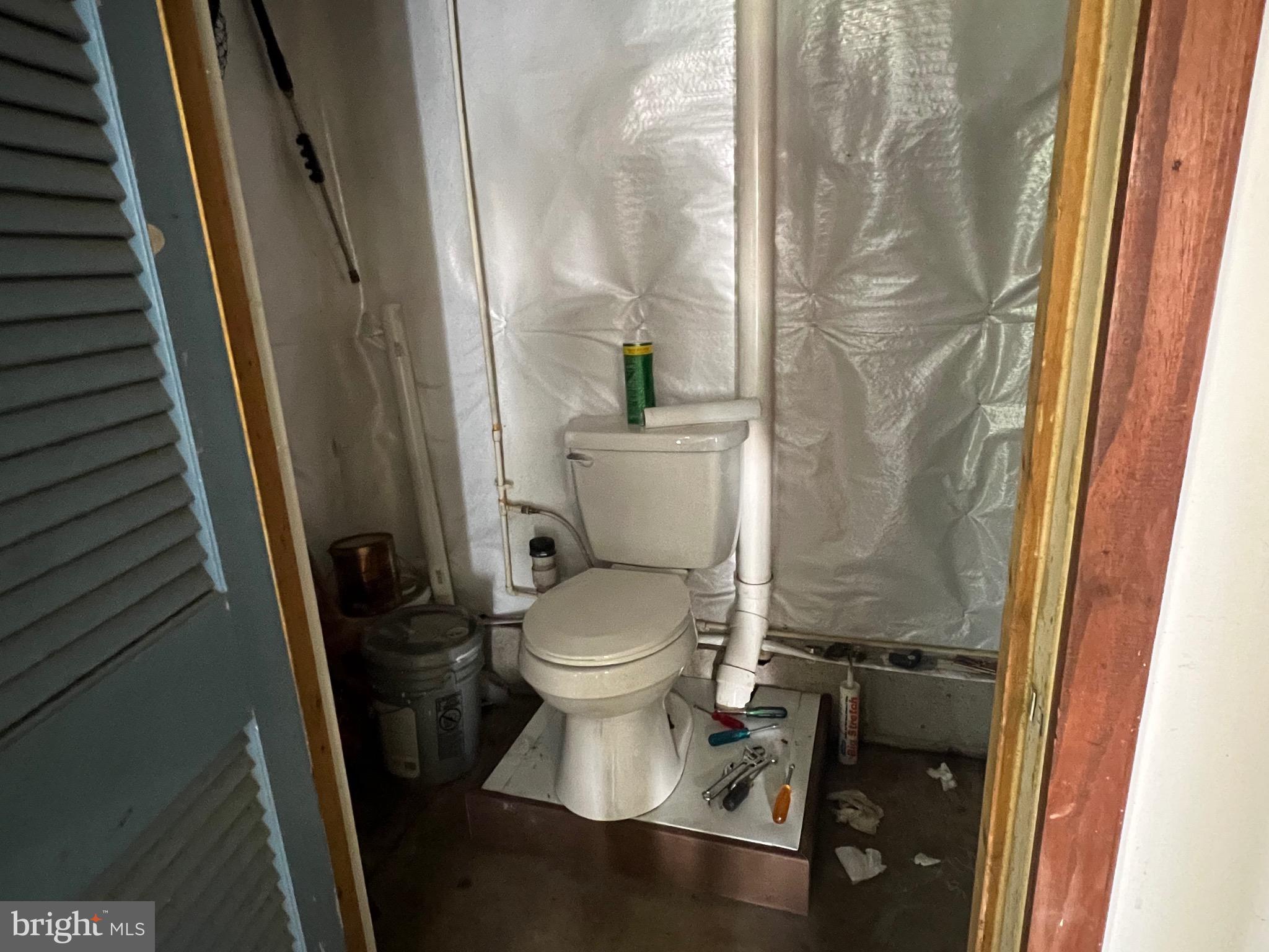 2205 Back Road Woodstock, VA 22664 - Photo 41 of 87 Water Closet in Garage/Workshop