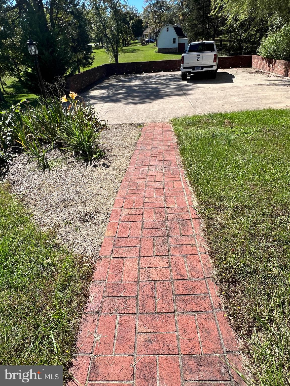 2205 Back Road Woodstock, VA 22664 - Photo 6 of 87 Brick Paver Sidewalk and Concrete Parking Pad