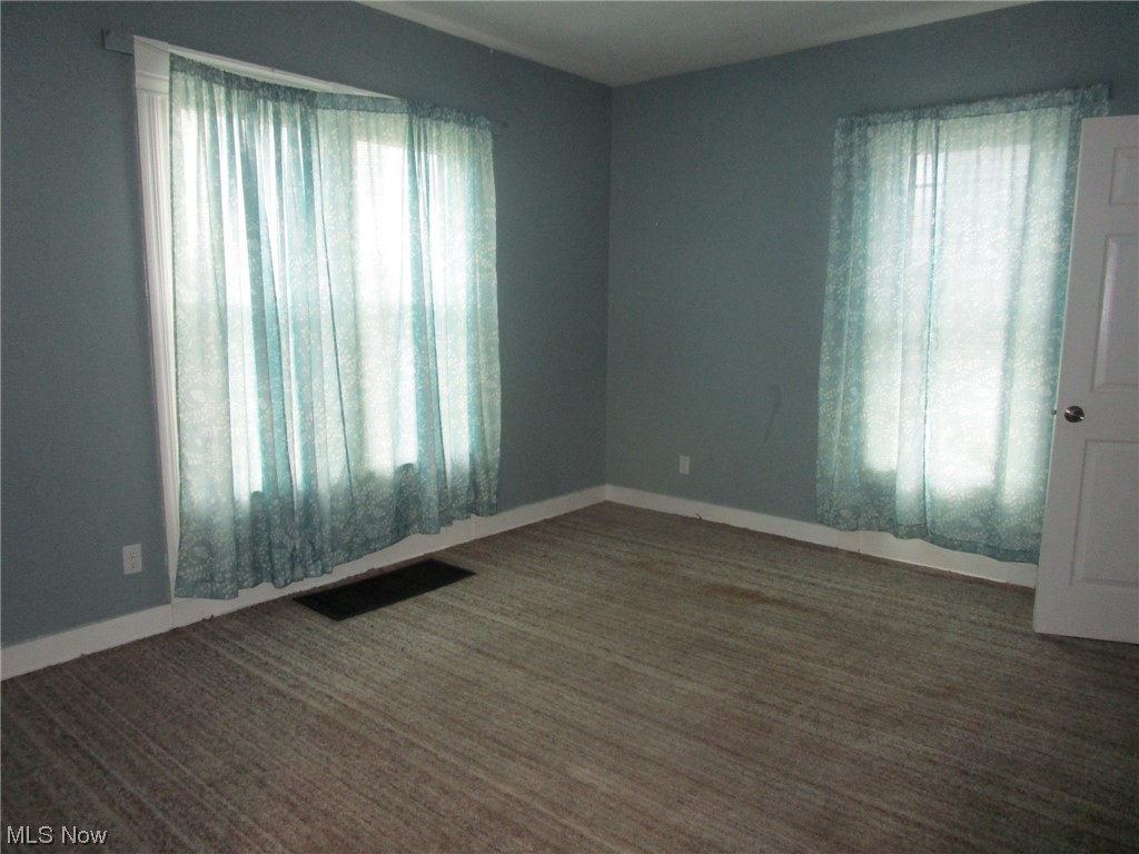 1938 East Prospect Road Ashtabula, OH 44004 - Photo 9 of 49 Family Room with attached half bath