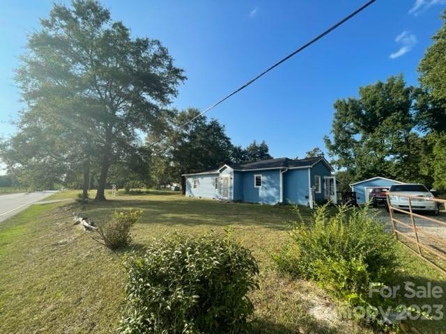 3927 Flat Creek Road Lancaster, SC 29720 - Photo 3 of 15 a view of backyard with outdoor seating and green space