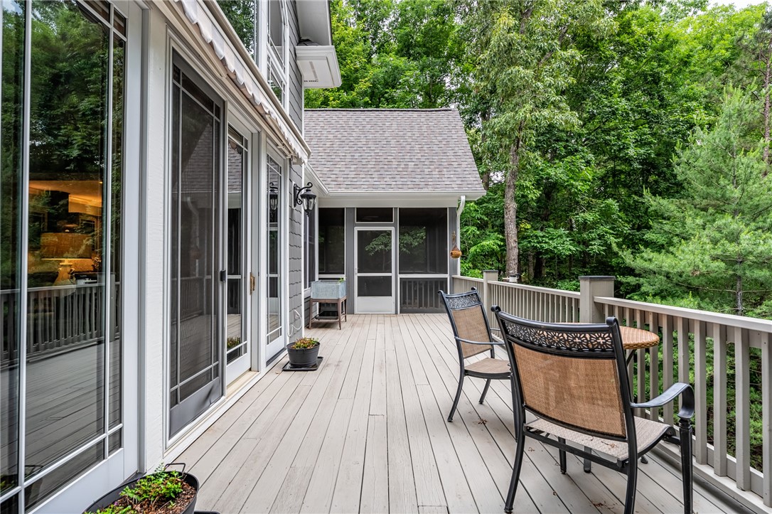606 Wind Flower Drive Sunset, SC 29685 - Photo 21 of 49 Deck stretches from Master to Kitchen