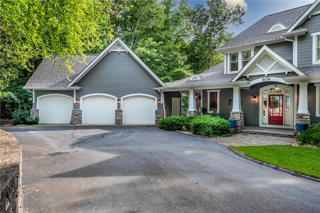 606 Wind Flower Drive Sunset, SC 29685 - Photo 3 of 49 3 car garage & semi circle driveway