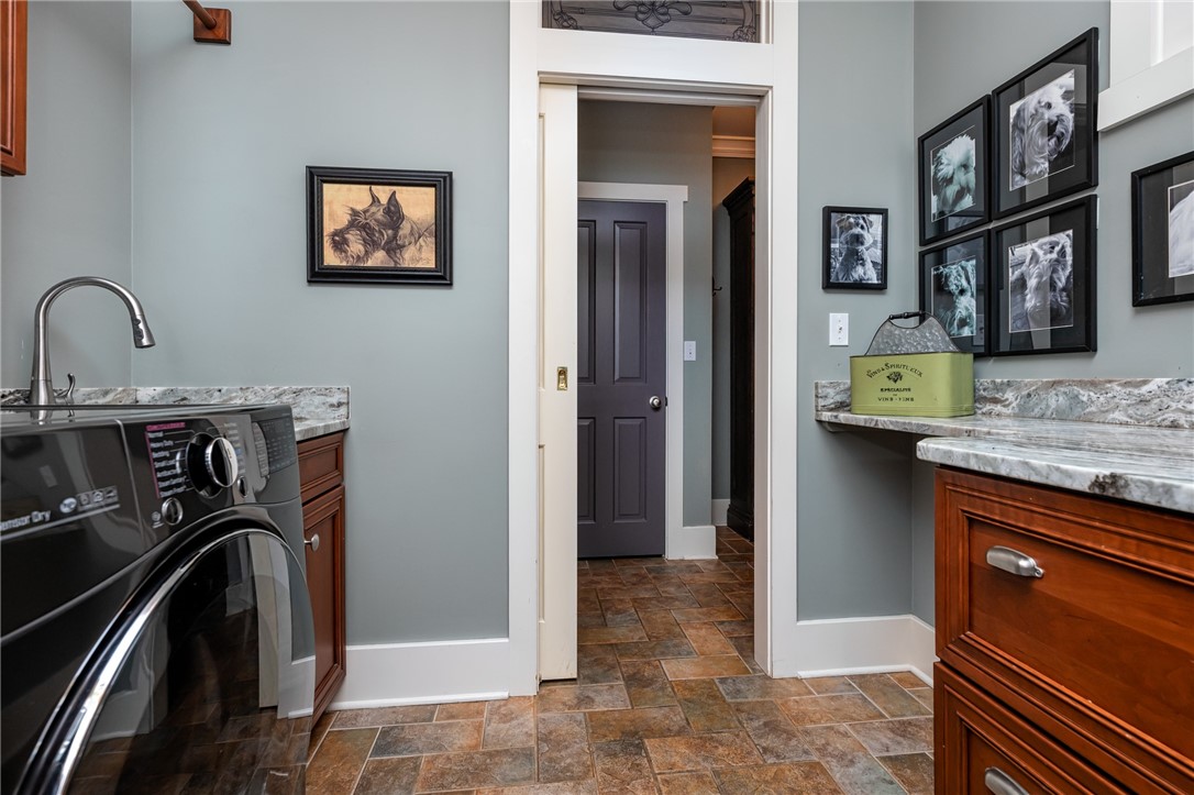 606 Wind Flower Drive Sunset, SC 29685 - Photo 31 of 49 Laundry with granite counters