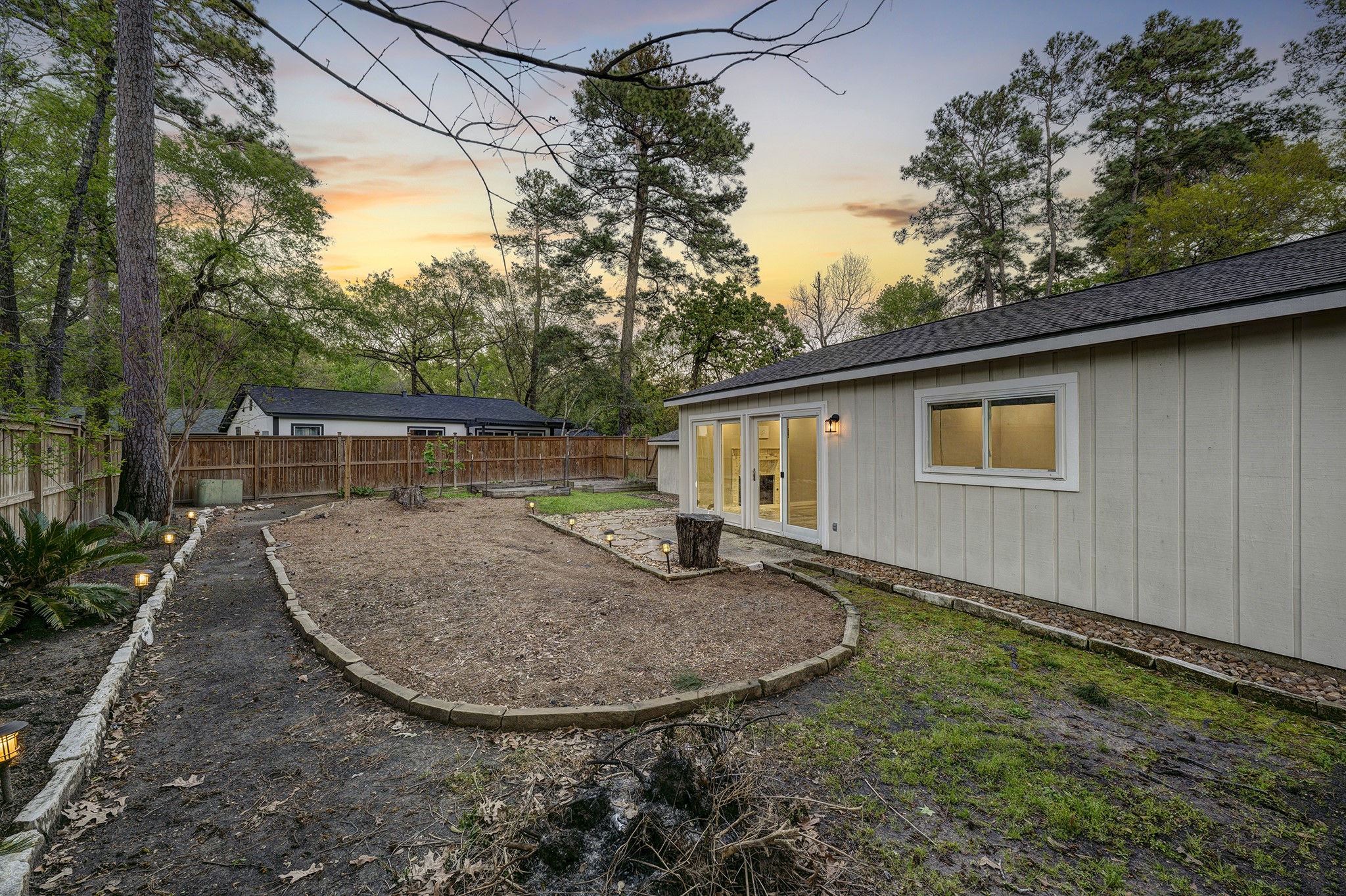 1911 North Red Cedar Circle Spring, TX 77380 - Photo 9 of 9 a view of a backyard with a garden