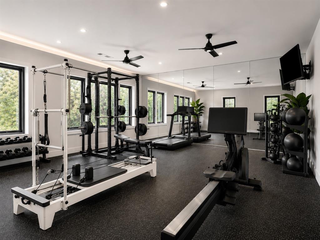 6413 Old Gate Road Plano, TX 75024 - Photo 29 of 39 a room with gym equipment and a large window