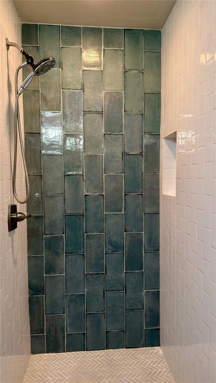 2510 Dewitt Street Irving, TX 75062 - Photo 9 of 17 a bathroom with a shower and a sink