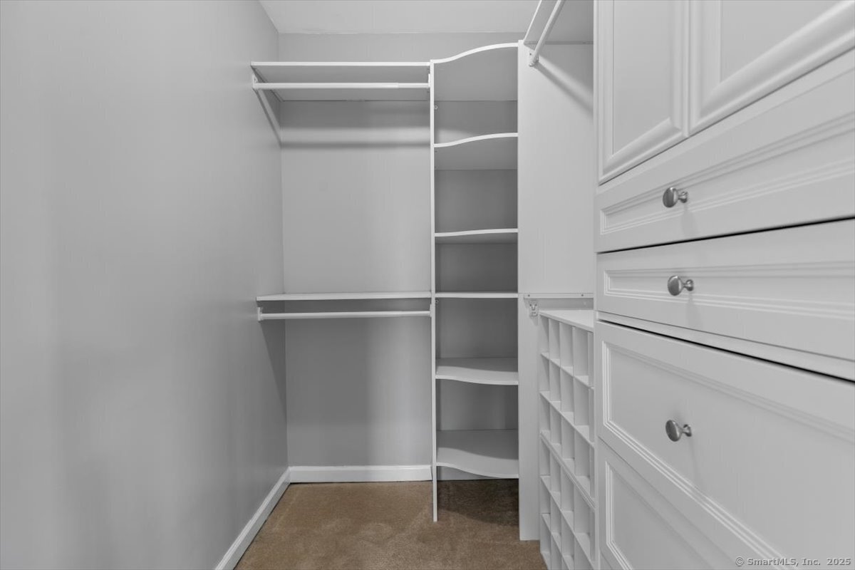 677 Quinnipiac Avenue, Unit 9 New Haven, CT 06513 - Photo 31 of 36 a view of an empty walk in closet