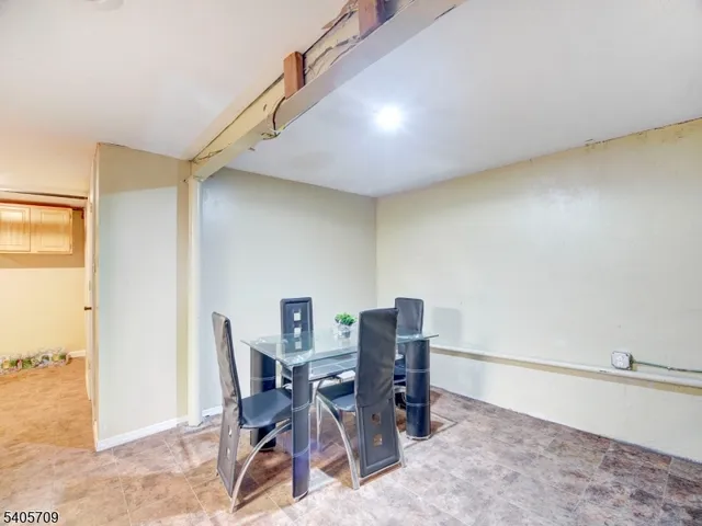 a workspace with furniture and a window