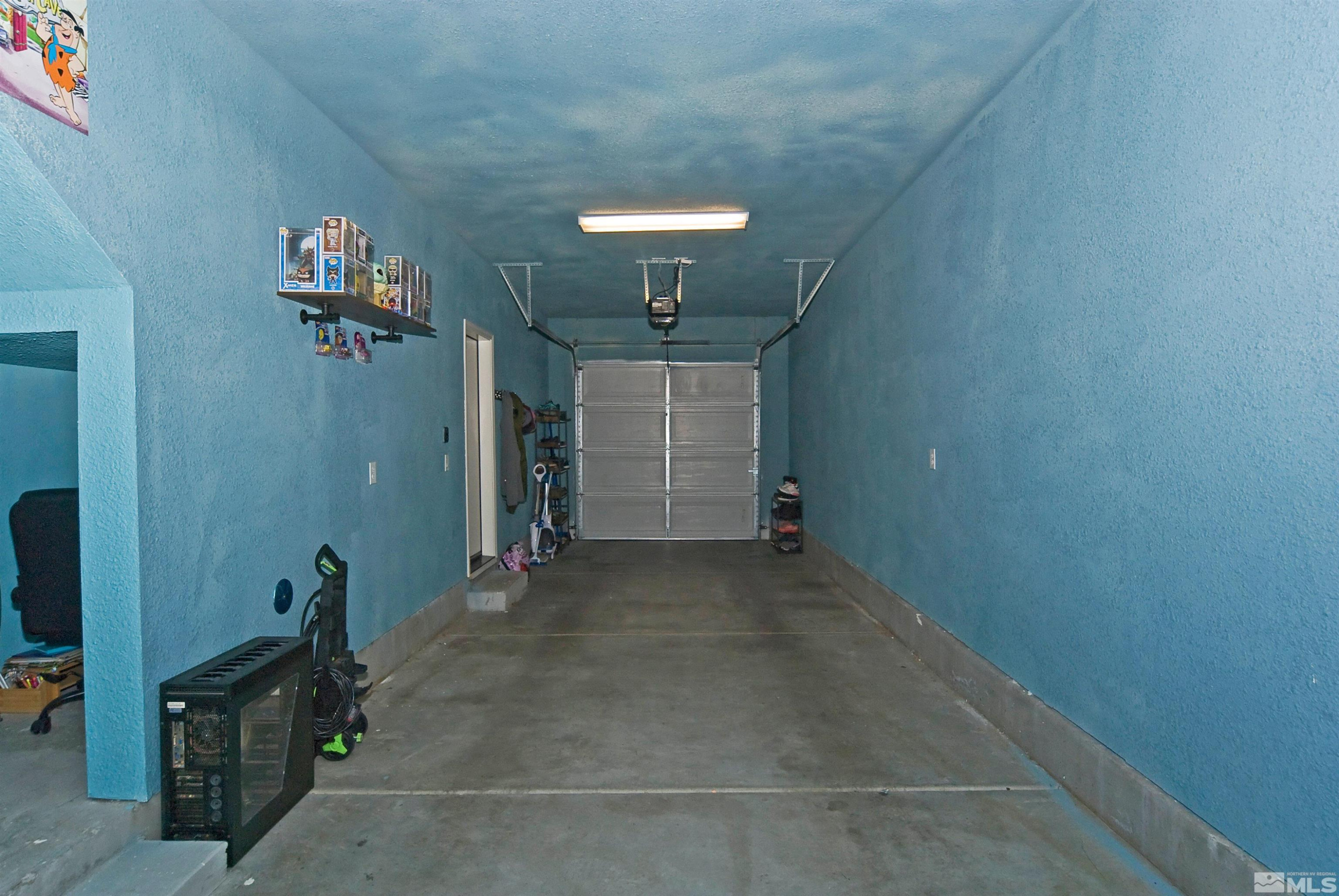 3006 Sterling Ridge Circle Sparks, NV 89431 - Photo 10 of 29 an empty room with shelves