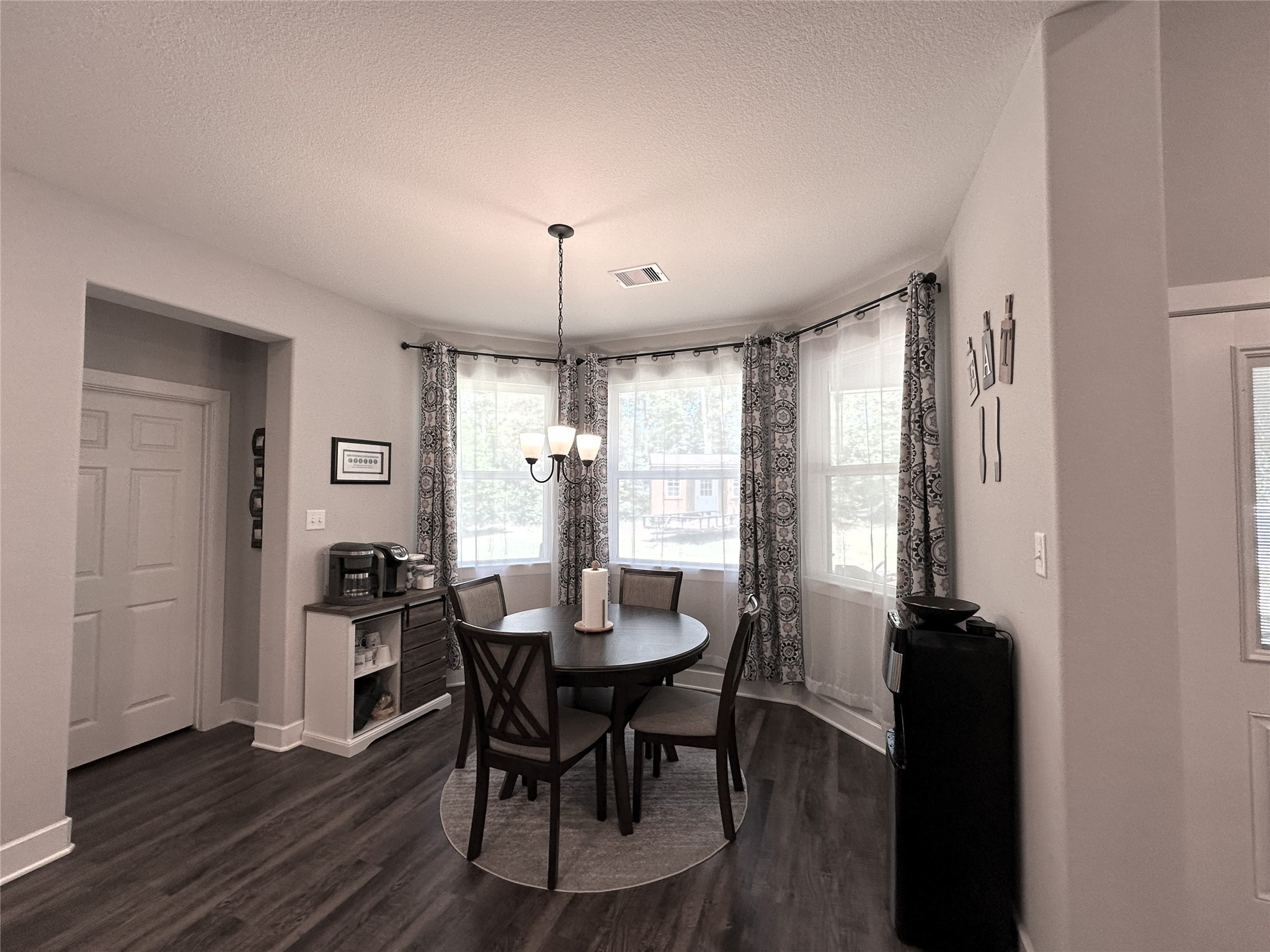 14144 Old Highway 59N Splendora, TX 77372 - Photo 19 of 24 a view of a dining room with furniture and window