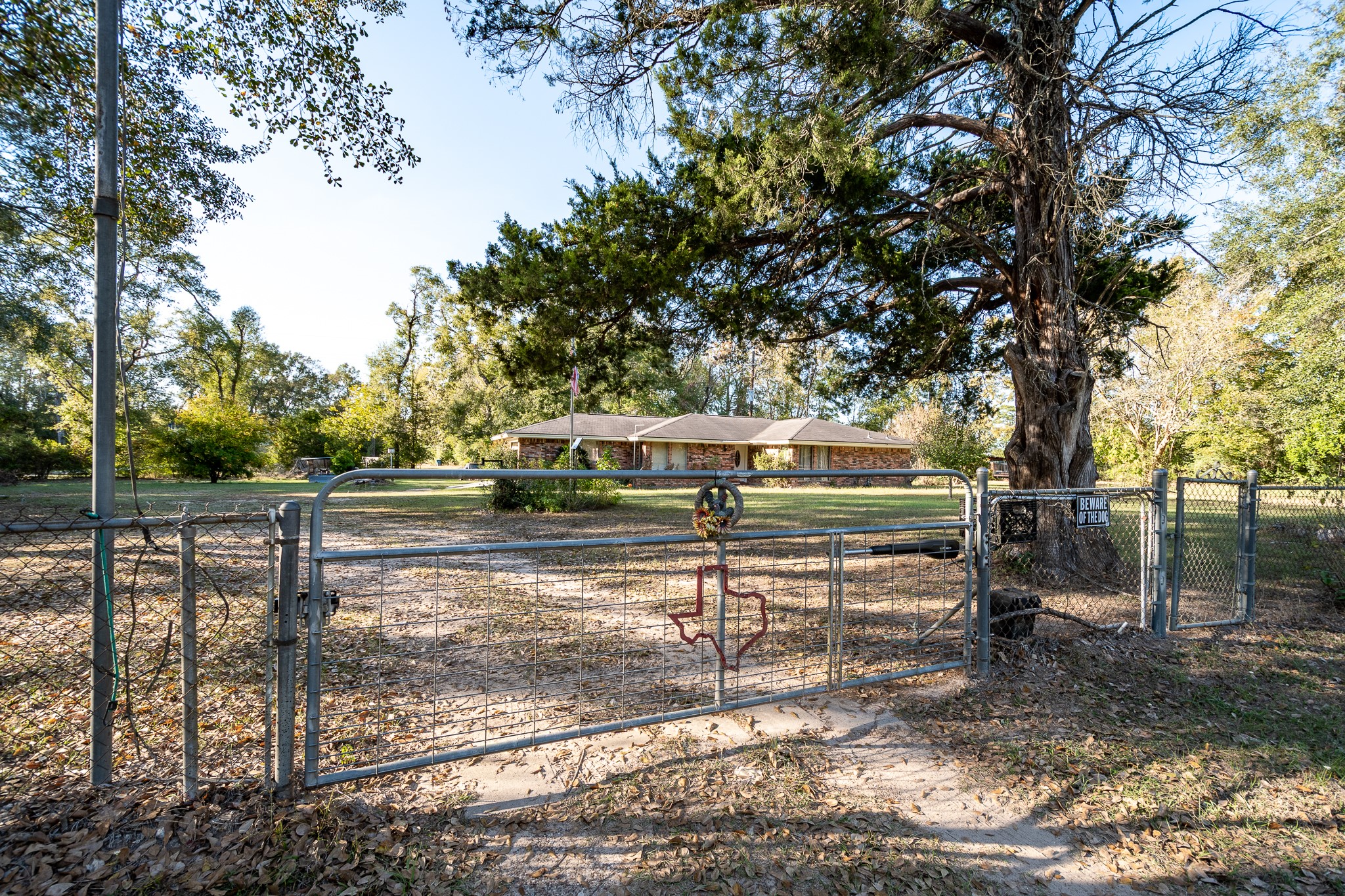 14144 Old Highway 59N Splendora, TX 77372 - Photo 2 of 24 a view of a park with large trees