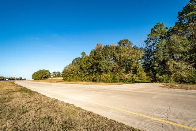 a view of a balcony with chairs