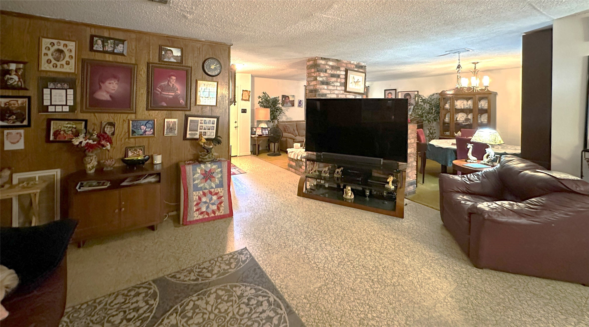 14144 Old Highway 59N Splendora, TX 77372 - Photo 5 of 24 a living room with furniture and a flat screen tv
