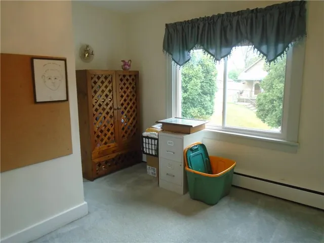 a room with furniture and a window