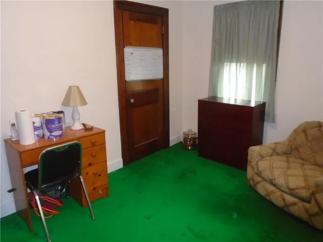 a workspace with furniture and a window