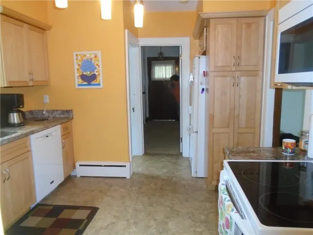 a bathroom with a sink and a washing machine