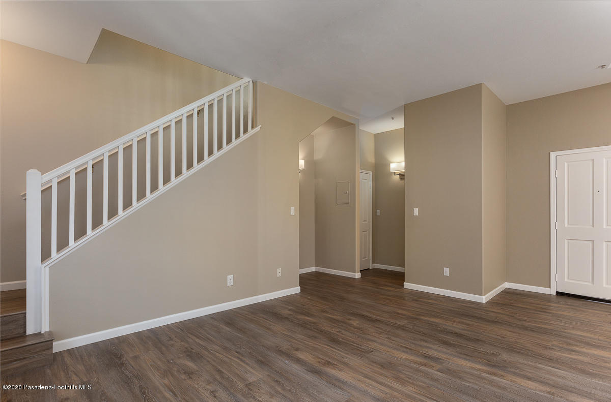 306 Alpine Street, Unit 3 Pasadena, CA 91106 - Photo 13 of 26 a view of an empty room with wooden floor