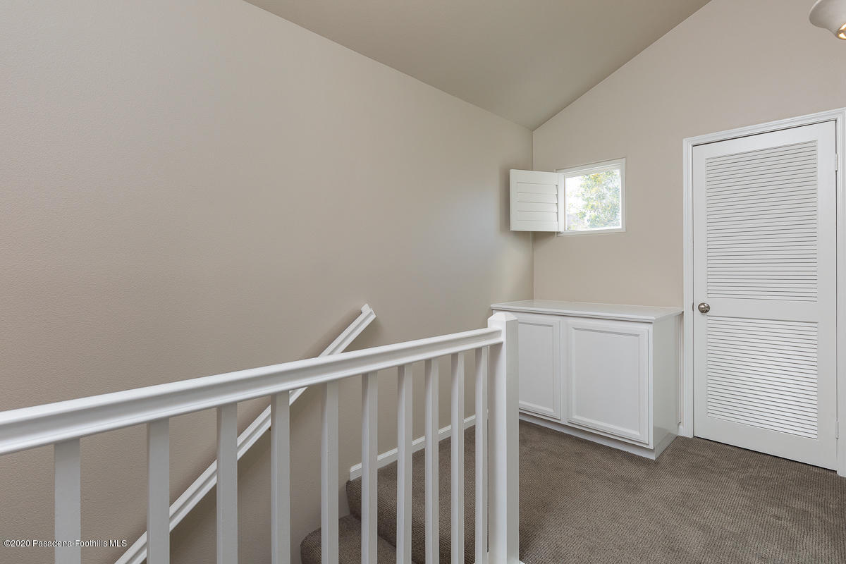 306 Alpine Street, Unit 3 Pasadena, CA 91106 - Photo 14 of 26 a view of a hallway with closet