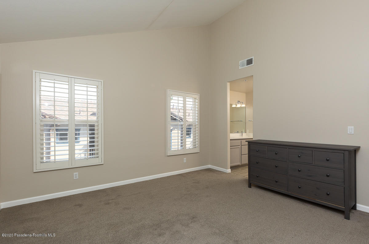 306 Alpine Street, Unit 3 Pasadena, CA 91106 - Photo 16 of 26 a view of an empty room with window and cabinet