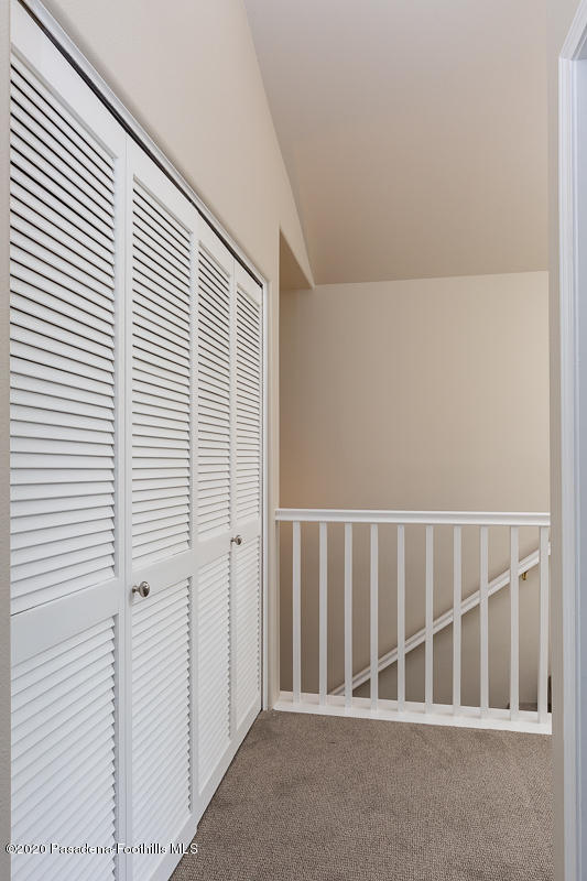 306 Alpine Street, Unit 3 Pasadena, CA 91106 - Photo 19 of 26 a view of staircase with white walls