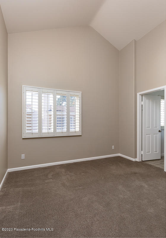 306 Alpine Street, Unit 3 Pasadena, CA 91106 - Photo 20 of 26 an empty room with windows