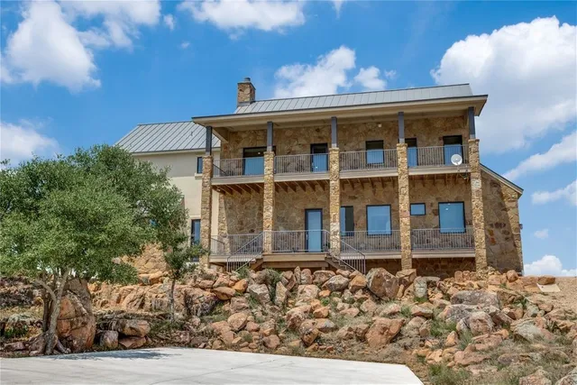 front view of a house with a dry yard